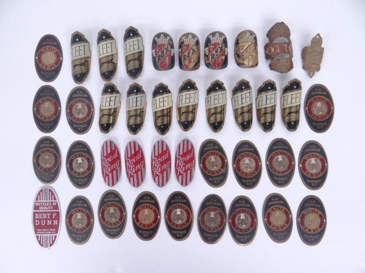Bicycle Headbadge Lot: Lot 40 bicycle headbadges including Fleet (multiples), Road King (multiples), Rex (multiples), White Eagle (multiples), The Companion, Otto etc. Fair to good condition. Pedaling History Museum.