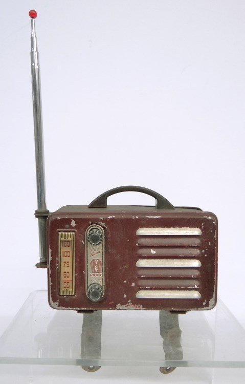 Vintage Tom Thumb Bike Radio: Vintage Tom Thumb Bike Radio. Features mounting bracket. Fair condition. Pedaling History Museum.