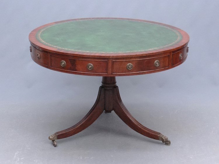 English Drum Table: Custom mahogany English multi-drawer drum table with leather top. Top 41" diameter. Stamped England underside.