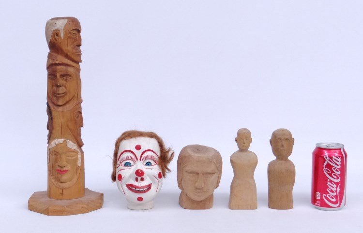 Folk Art Lot: Lot five pieces carved wooden folk art including face totem (14 1/2" Ht.), marked "R R" underside, clown head, two busts and head.
