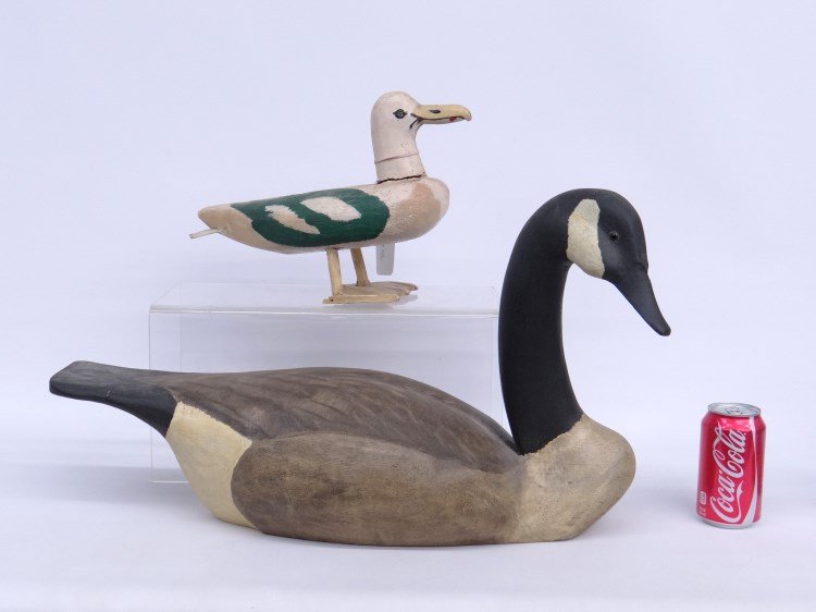 Decoy Lot: Lot including painted wooden Canada goose decoy signed and dated 1984 underside, along with painted primitive wooden seagull (foot damaged).