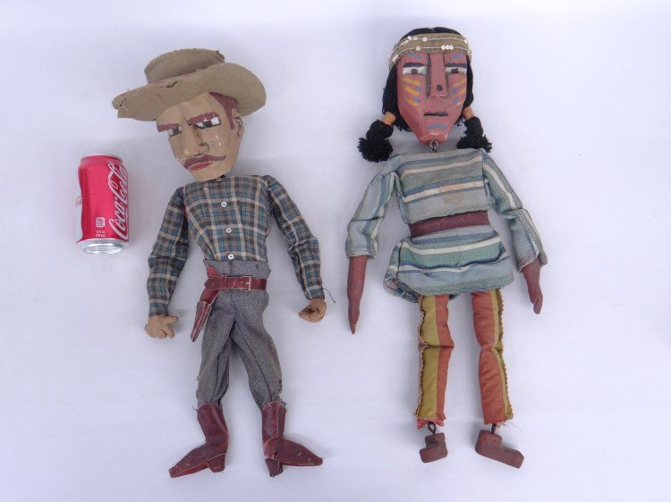 Folk Art Puppets: Folk art polychrome painted wood clothed cowboy and Native American figures. 20" Ht.
