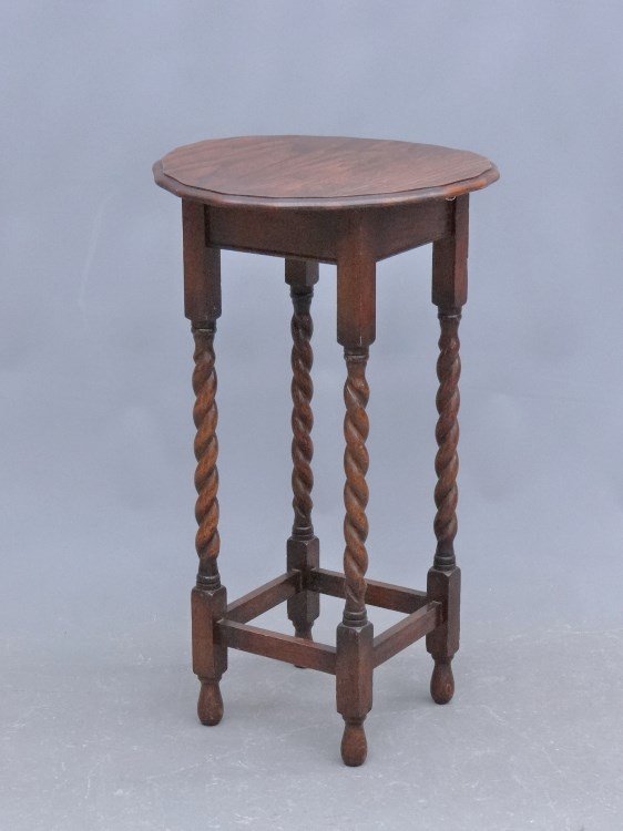 Oak Lamp Table: Oak shaped top lamp table with barley corn shaped legs. 17" diameter, 29 1/2" Ht.