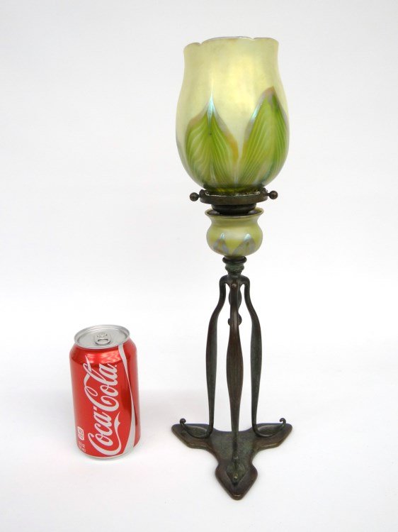 Tiffany Candlestick: Signed Tiffany Studios (#1812?) bronze candlestick with shade (shade has chipping on base). 15 1/4" Ht.