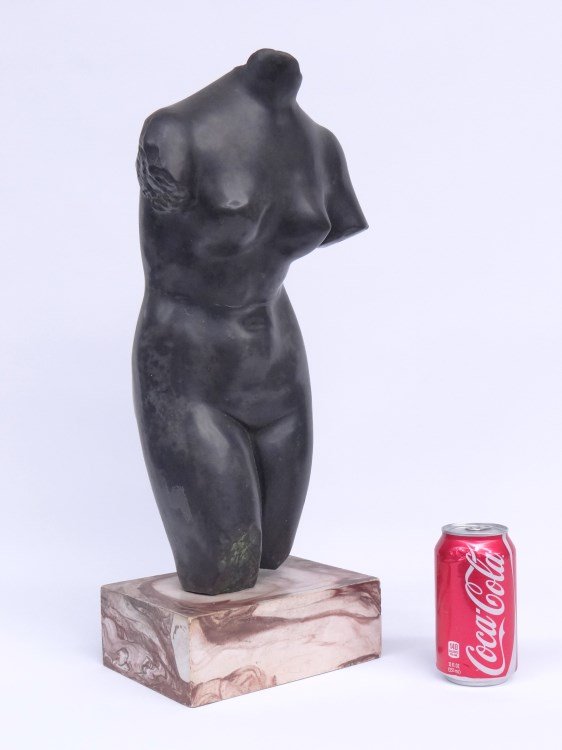 Plaster Statue: Plaster bust statue on marble base. 19 1/2" Ht., partial label underside "Alva Studios New York...".