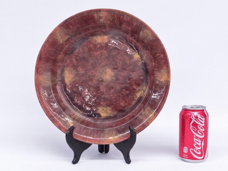 Redware Plate: Early redware glazed plate. 12" diameter.