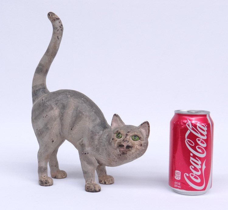 Doorstop: Painted cat doorstop. 8" length, 11" Ht.