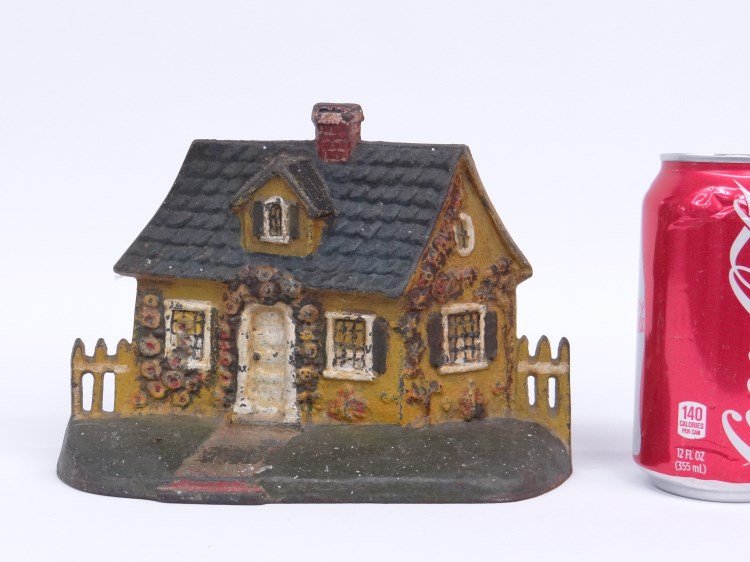 Doorstop: Painted house doorstop. 6" Ht.