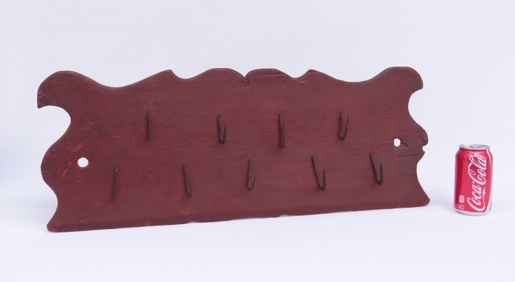 Hook Rack: 19th c. hook rack in red paint. 27" W.