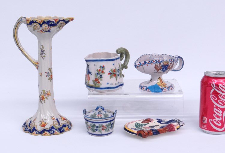 Misc. Lot: Misc. lot including Quimper spoon holder, pitcher, pot with cover, faience candlestick and faience chamberstick (base as is).