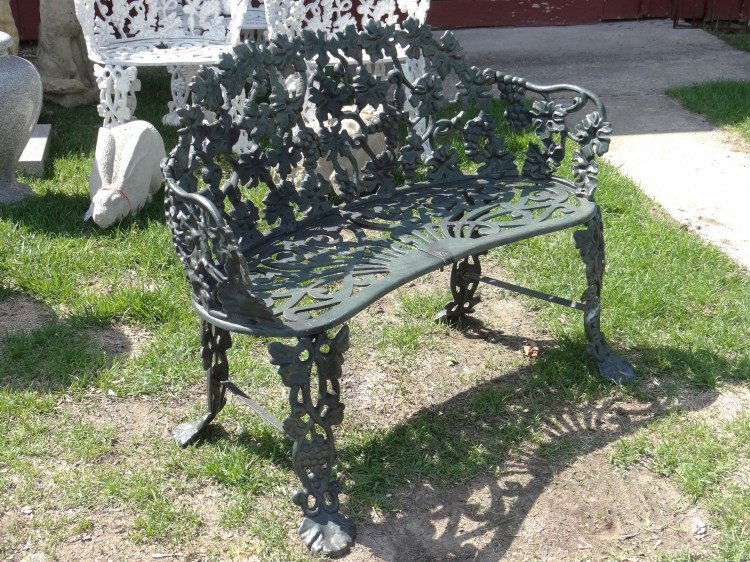 Cast Iron Settee: Cast iron grape and leaf pattern settee. 38" W.