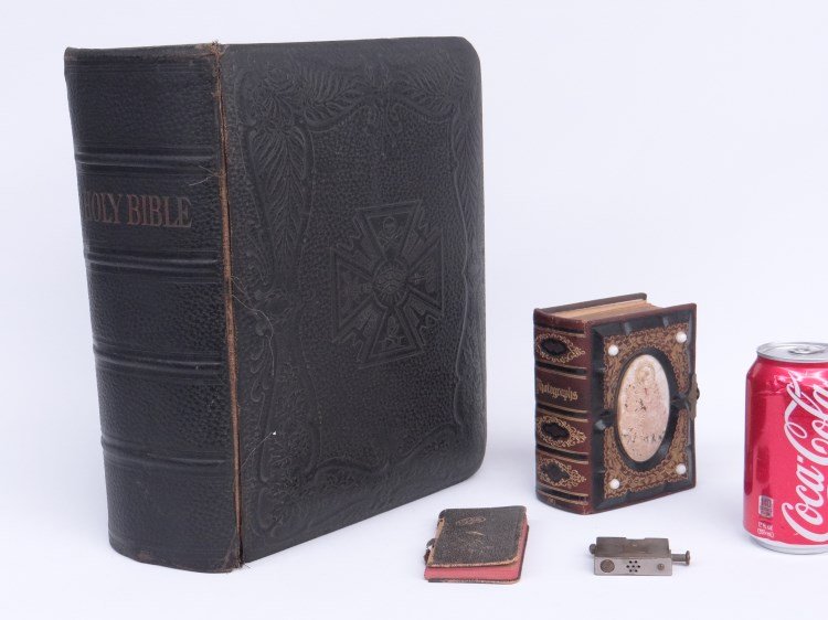 Misc. Lot: Misc. lot including early lighter marked "Turbinen Schnelldampfer Bremen", photo album, 1944 book, early Masonic bible.