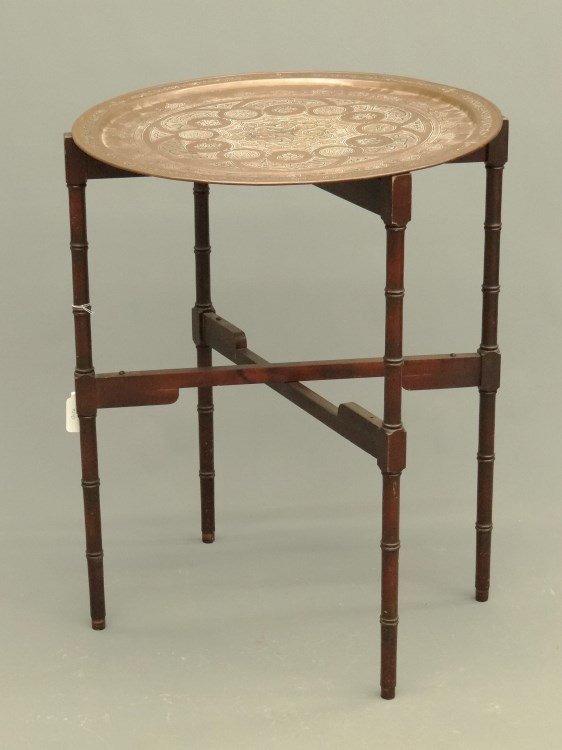 Copper Tray On Stand: Copper Middle Eastern tray on stand. Tray 26" diameter, 34" Ht. Top doesn't fit base.
