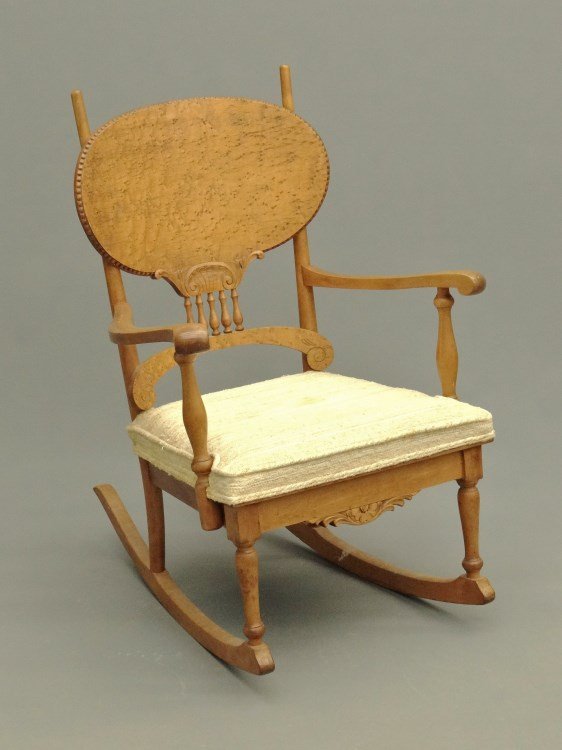C. 1900's Rocking Chair: C. 1900's birdseye maple rocking chair with upholstered seat.