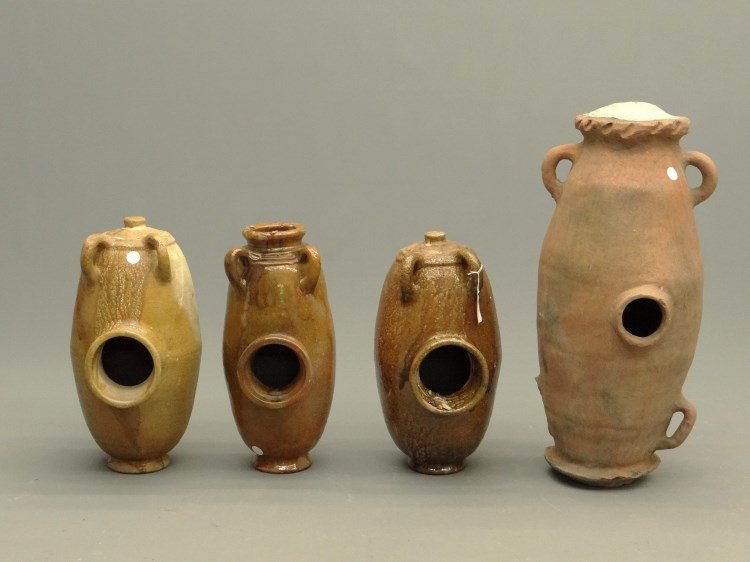 Redware Vessels: Lot of four redware vessles. 20" to 30" Ht.