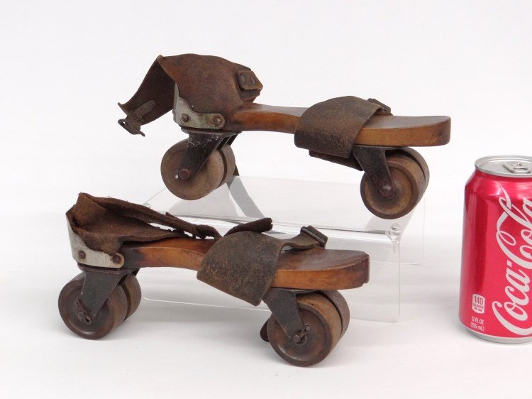 Roller Skates: Pair wood and metal four wheel roller skates. 9" length, 4 1/4" Ht. Provenance: The David Metz Museum Freehold New Jersey.