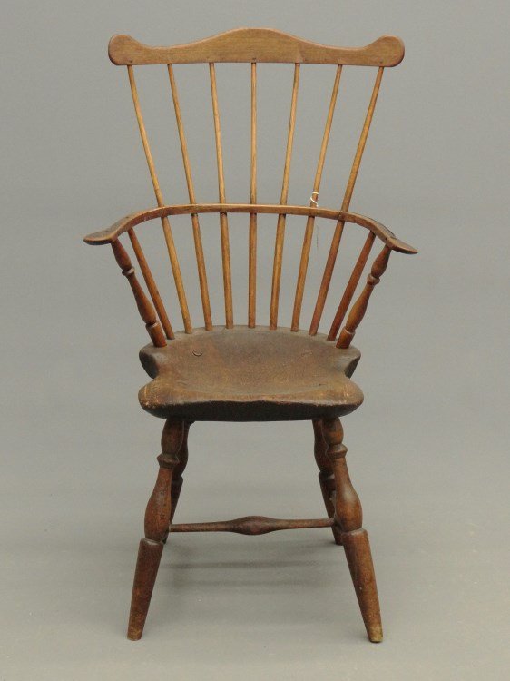 19th c. Windsor Arm Chair: 19th c. comb back Windsor arm chair with old blacksmith repairs. 18" seat Ht., 39" Ht.
