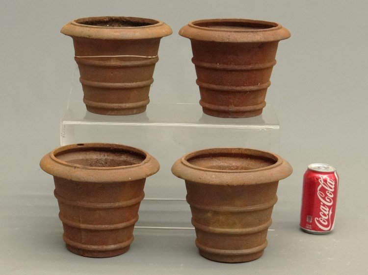 Cast Iron Flower Pots: Lot of four cast iron flower pots. 7" Ht.