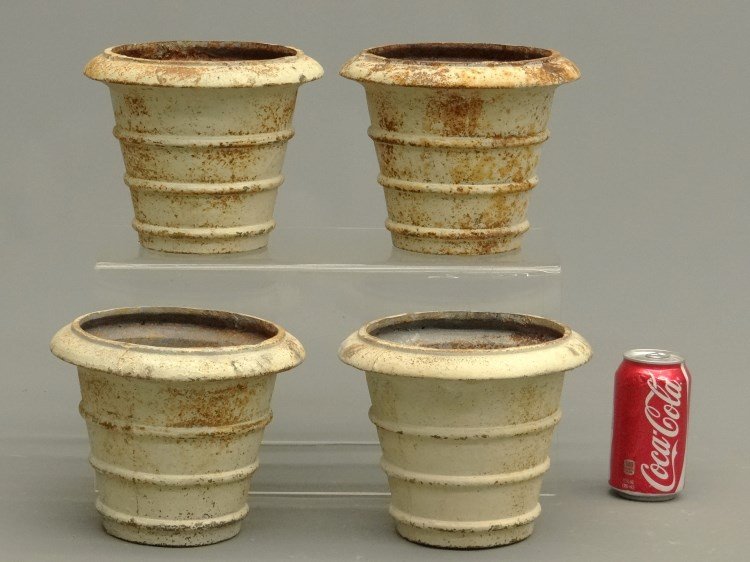 Cast Iron Flower Pots: Lot of four cast iron flower pots. 7" Ht.
