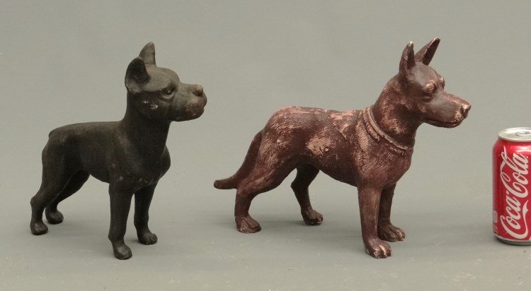 Cast Iron Dogs: Lot two cast iron dogs. 13" length, 10" Ht.