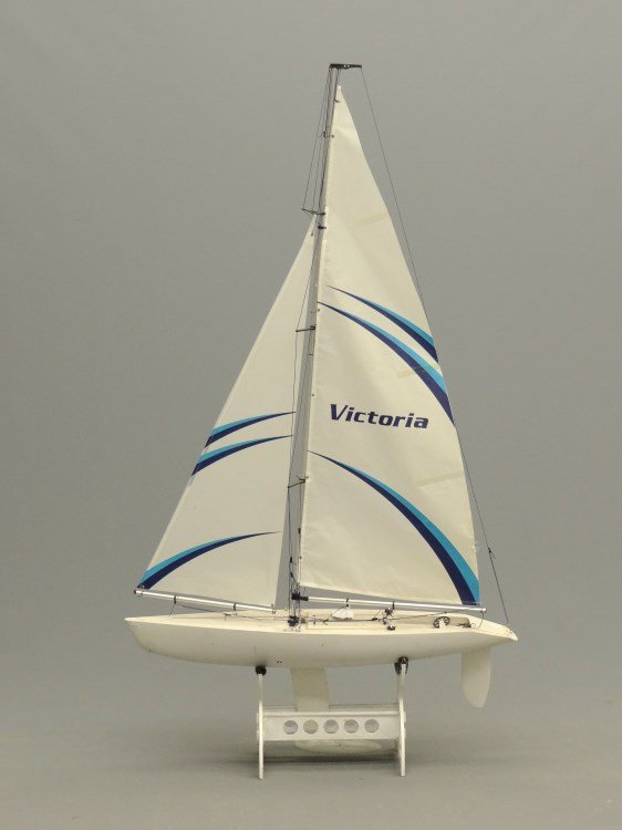 Pond Boat: Pond boat, sails marked "Victoria". 30" W, 54" Ht.