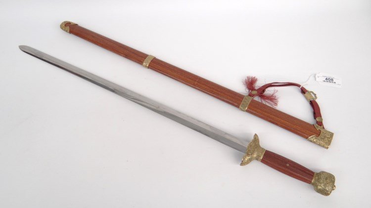 Replica Chinese Dao Sword: Replica Chinese Dao (7 Stars Trading Co.) straight steel blade, ornate cast brass accoutrements, rosewood and cast brass scabbard. 39 1/2" L.
