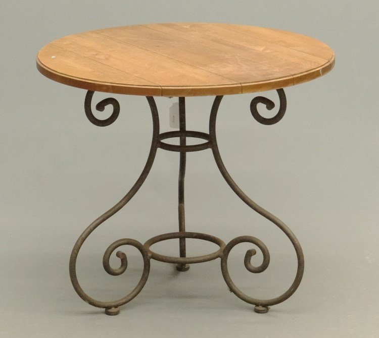 Iron Base Table: Iron base round top table. Top 26" diameter, 25" Ht.
