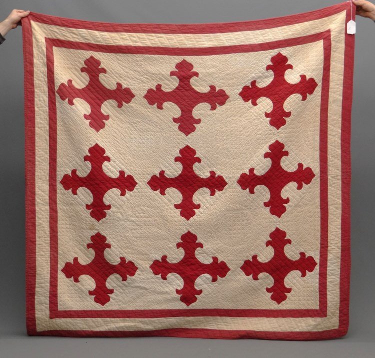 Quilt: 19th c. red and white applique quilt. 68" x 77". Has label with info including "Owner Betsy Riley-Hudson N.Y. June 1994". Staining. Provenance: Hudson N.Y. Home For The Aged.