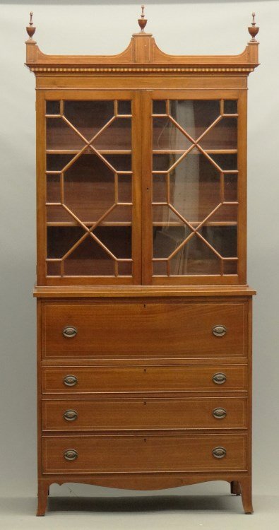 Custom Mahogany Secretary: Custom mahogany two part Hepplewhite style inlaid secretary. Top has two glazed doors, base with butlers drawer. Case raised on French feet. 44 1/2"x 21" x 7' 5" Ht.