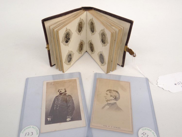 Photograph Lot: Lot including scarce album of gem size tintypes and two CDV's, Hon. W. H. Seward and Gen. B. Butler.