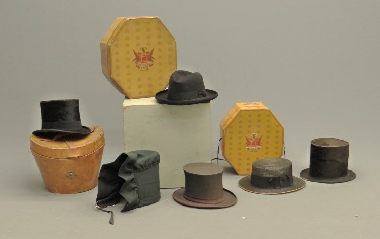 Hat Collection: Collection of early hats including: stovepipe beaver skin labeled "Henry & Romme 53 Dey St New York", collapsible top hat, beaver skin top hat labeled "Saks & Co. NY" includes fitted leather hat box, 