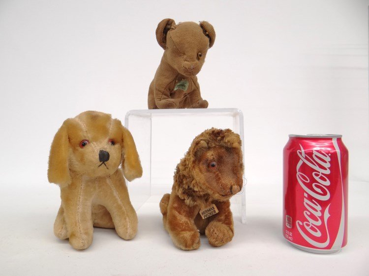 Stuffed Animal Lot: Lot three stuffed animals including two with orig. hang tags "Herman Pecker" and "Cubby Jungle Toys".