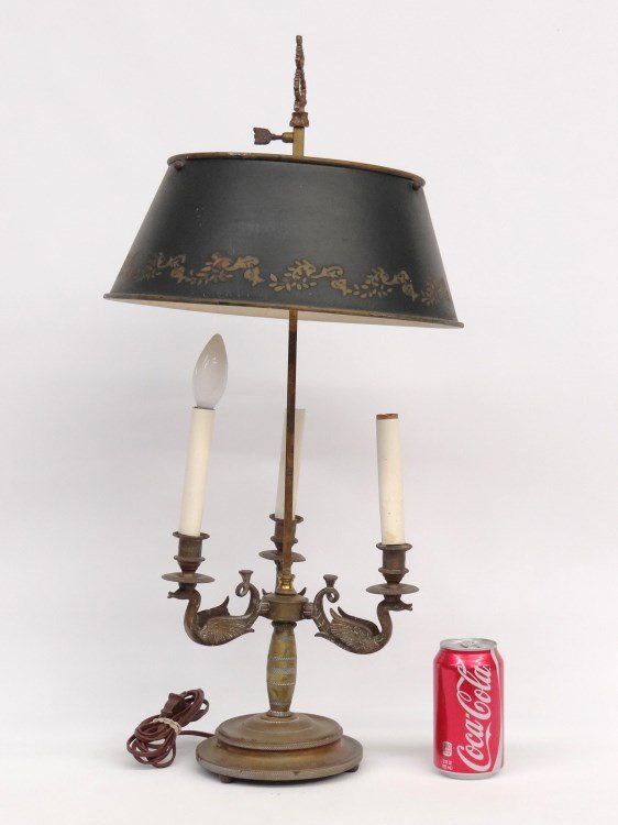 Lamp: Brass figural lamp with tole shade. 28" Ht.