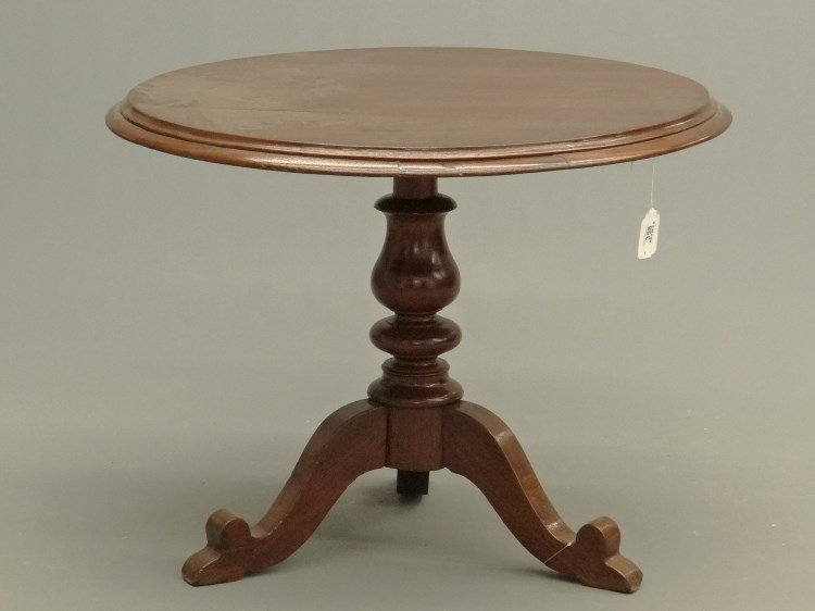 Center Table: Mahogany tripod base center table. Top 34" D., 27" Ht.