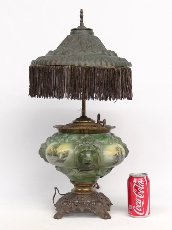 Gone With The Wind Lamp: C. 1900's Bradley & Hubbard Gone With The Wind Lamp with stylized lions heads. 23" Ht., comes with metal shade (12" D.).