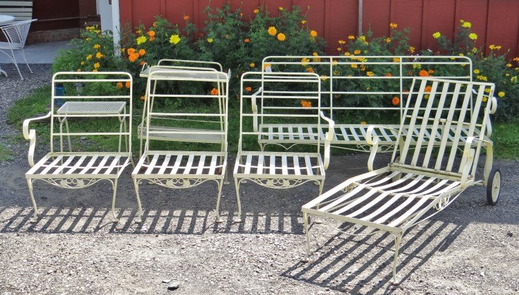 Wrought Iron Patio Set: Yellow wrought iron patio set including sofa, lounge chair, (3) chairs, rolling cart and side table including cushions.