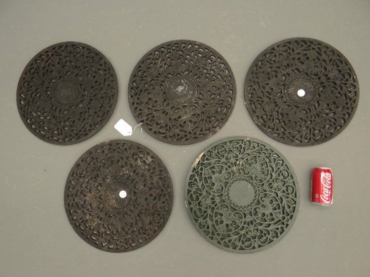 Cast Iron Grills: A lot of (5) round cast iron grills. 15 1/2" Dia..
