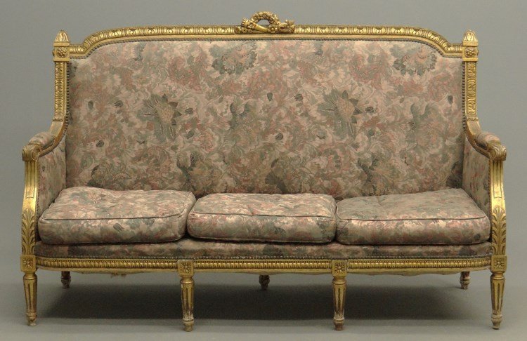Upholstered Settee: Carved upholstered French style settee. 65" W. Provenance Colgate Mansion (Paul Leka Estate).