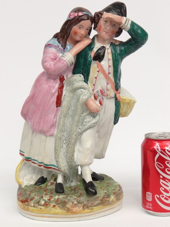Staffordshire Group Figurine: Early Staffordshire figurine embraced man and woman. 13 1/2" Ht. Provenance: Redwood New York Estate.