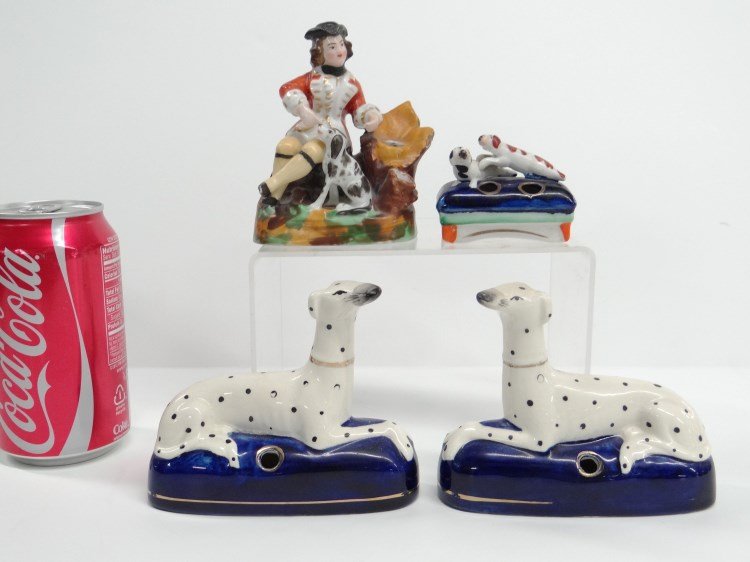 Staffordshire Inkwell Lot: Lot including pair Staffordshire type dogs, dogs on pillow figurine and group with man and dog. Provenance: Redwood New York Estate.