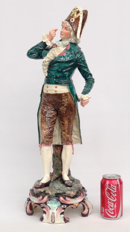 Majolica Figure Of A Man: Early Majolica figure of a man. Marked underside in blue. 25" Ht. Slight nick to back of hat not visible on glaze. Provenance: Redwood New York Estate.