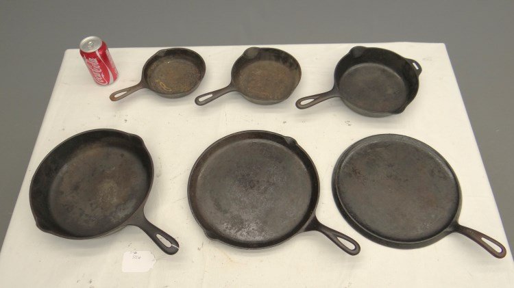 Cast Iron Cookware Including Griswold: Lot six piece cast iron skillets including signed Griswold.