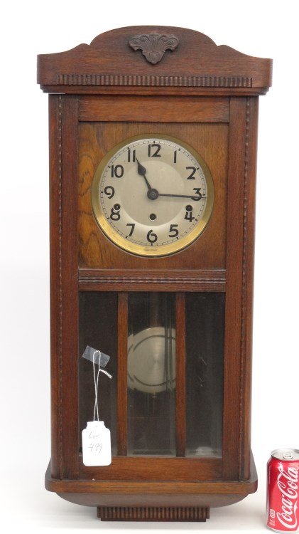 Regulator Wall Clock: German oak case regulator wall clock with beveled glass and ripple moulding. 13 1/2" x 7" x 30" Ht..