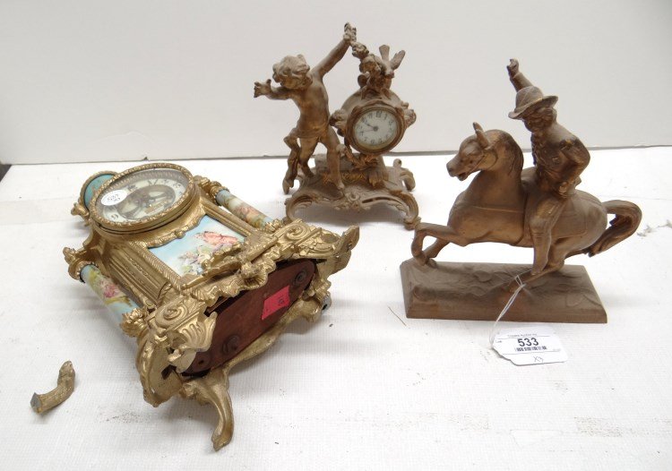 Clock Lot: Lot of white metal figural clocks with beveled glass and porcelain dial measures 8 3/4" Ht., white metal man on a horse, white metal and porcelain French clock (rear leg is broken).
