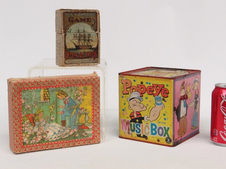 Toy Lot: Lot three pieces including Popeye Music Box, Pinafore game and Austrian block set.