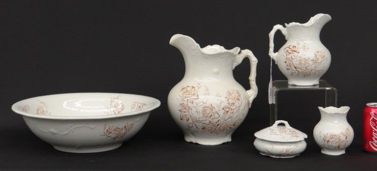 Ironstone China: Ironstone china set including pitcher and bowl, covered jar, two pitchers. Imperfections. Marked "Etruria".