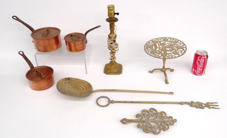 Metalware Lot: Misc. metalware lot including brass trivets, electrified candlestick, (3) copper pots with lids, strainer etc.
