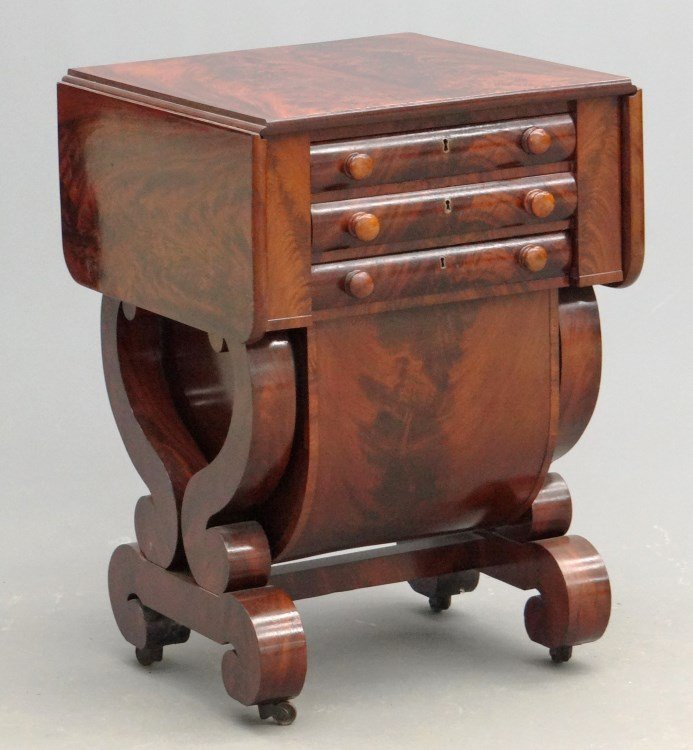 19th c. Empire Sewing Stand: 19th c. Empire rolled foot mahogany sewing stand with two drawers and sewing drawer. Top 20" x 20" with 10" leaves, 29 1/2" Ht.
