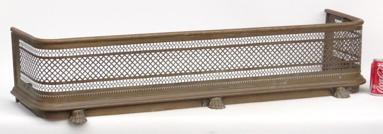 Fireplace Fender: 19th c. brass paw footed fireplace fender. 45 1/2" W.