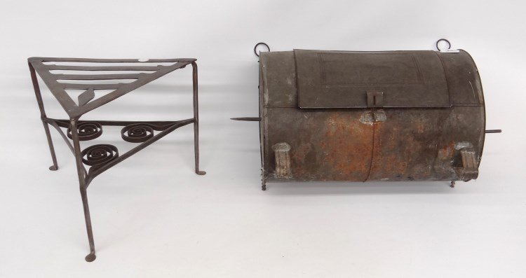 Metalware: Lot including early tin reflector stove (19" x 9"x 16" Ht.), along with iron trivet (15" x 14" x 13" Ht.). Provenance Dr. Jamie Turndorf Millbrook New York.